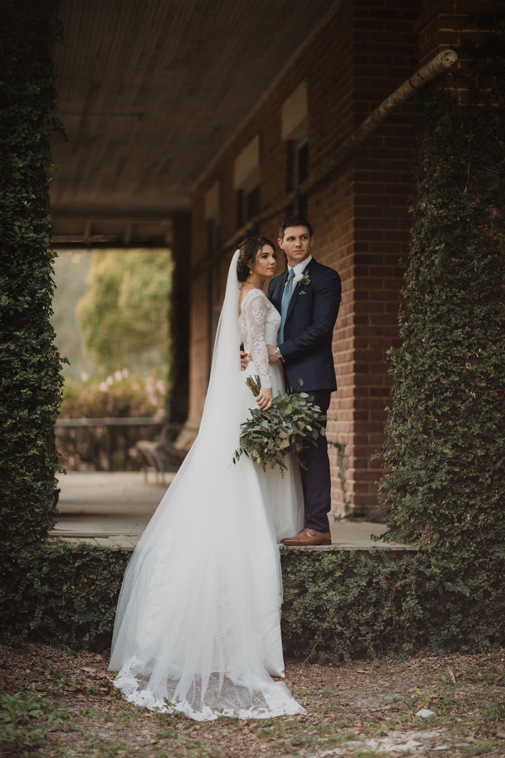 Long sleeve Alencon lace wedding dress